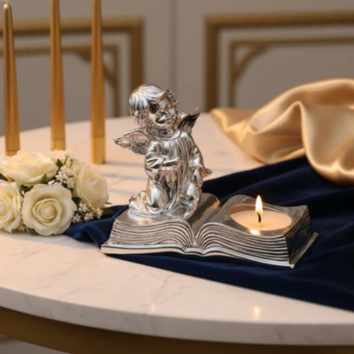 ANGEL WITH BOOK TEALIGHT SILVER GLOSSY