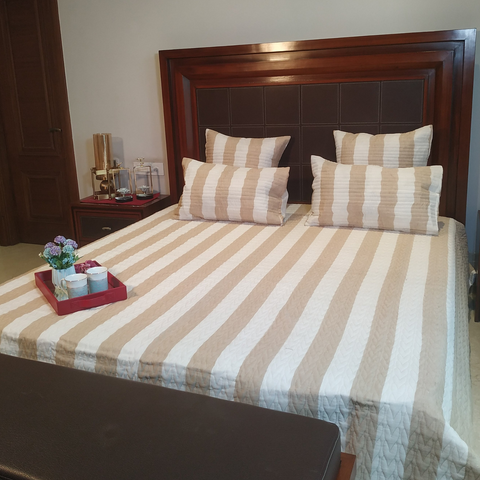 The LuxeLife Beige Striped Quilted Bedcover