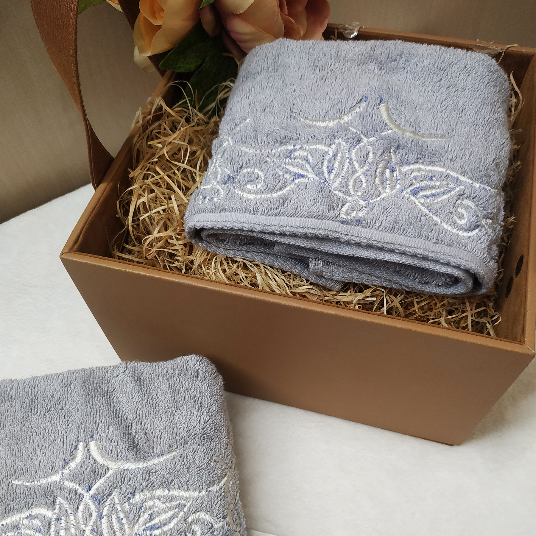 The Luxelife Grey Hand Towel with Silver Embroidery