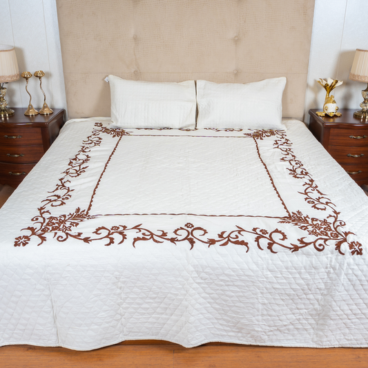 The LuxeLife White Quilted Brown Embroidered Bedcover
