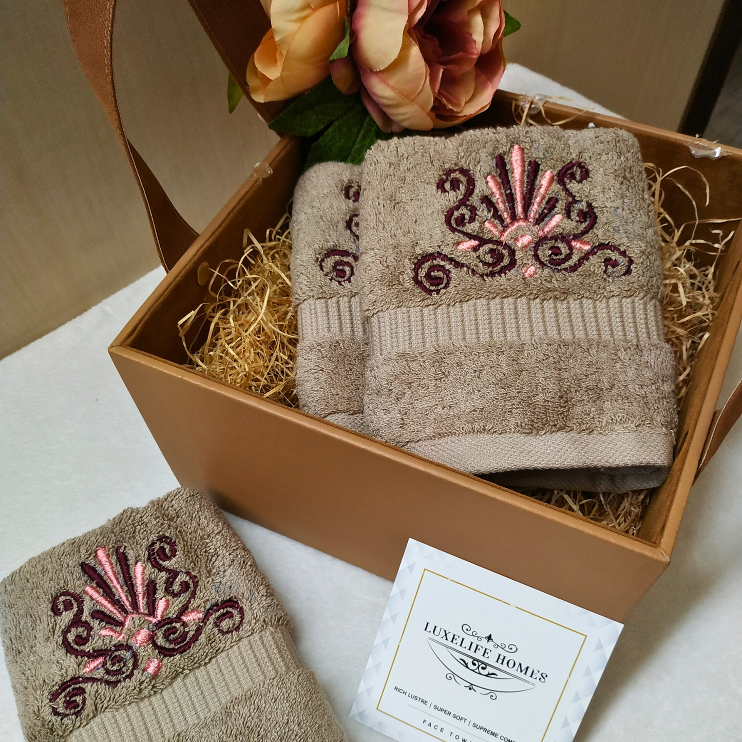 The Luxelife Dark Beige with flower in centre Embroidered Face Towel