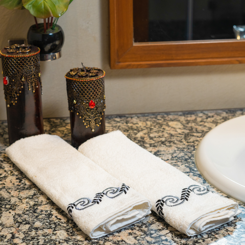 The LuxeLife White Hand Towel with Grey & Black Embroidered